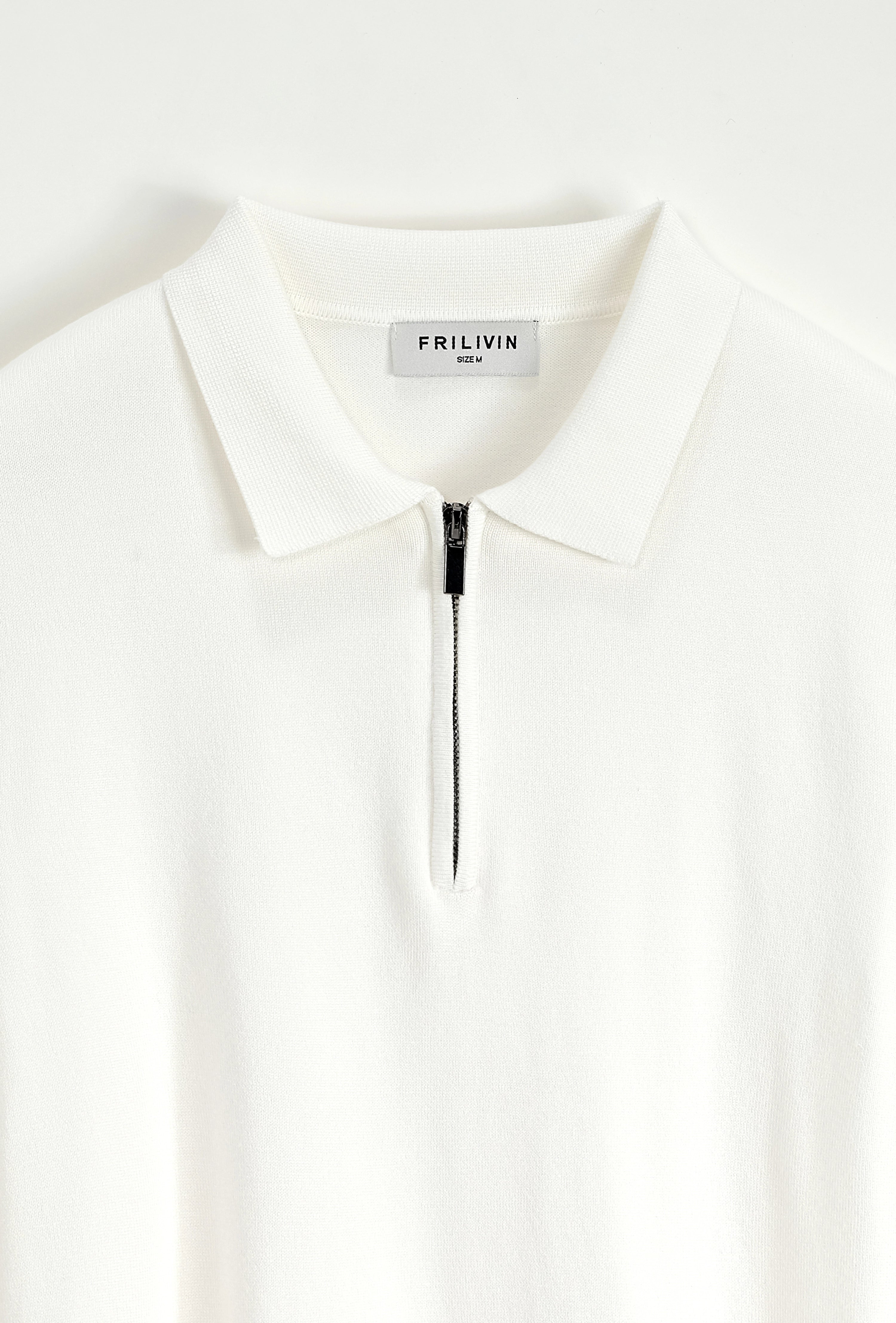 Pull à col chemise zipé