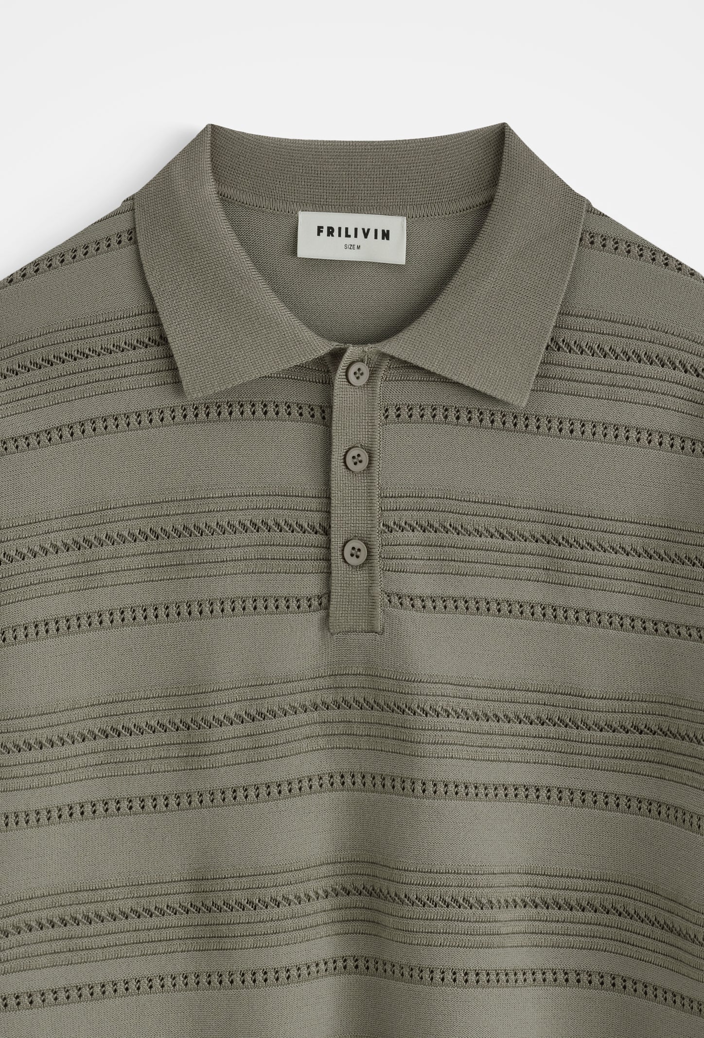 Polo tricoté rayures relief