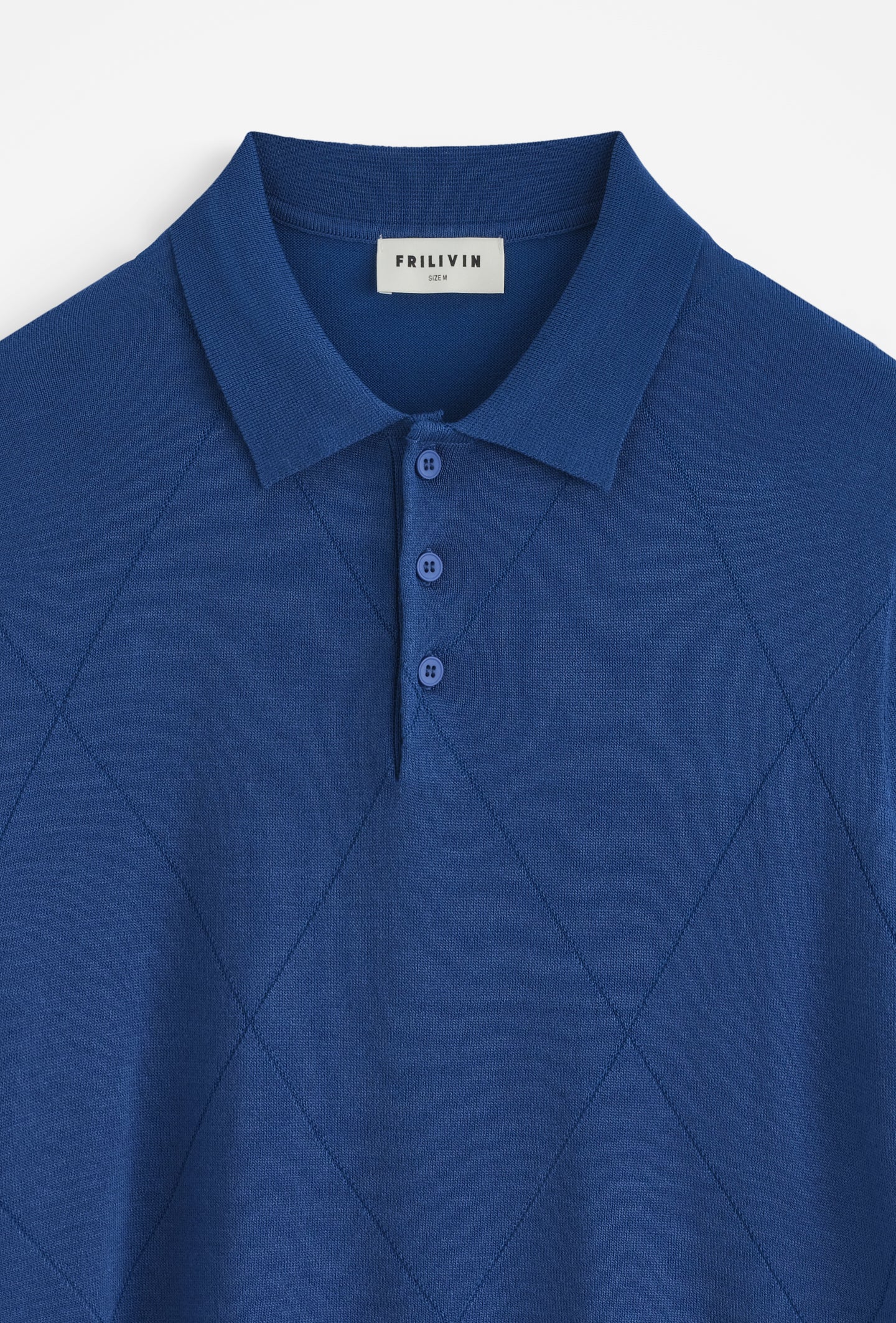 Polo tricoté motif losange