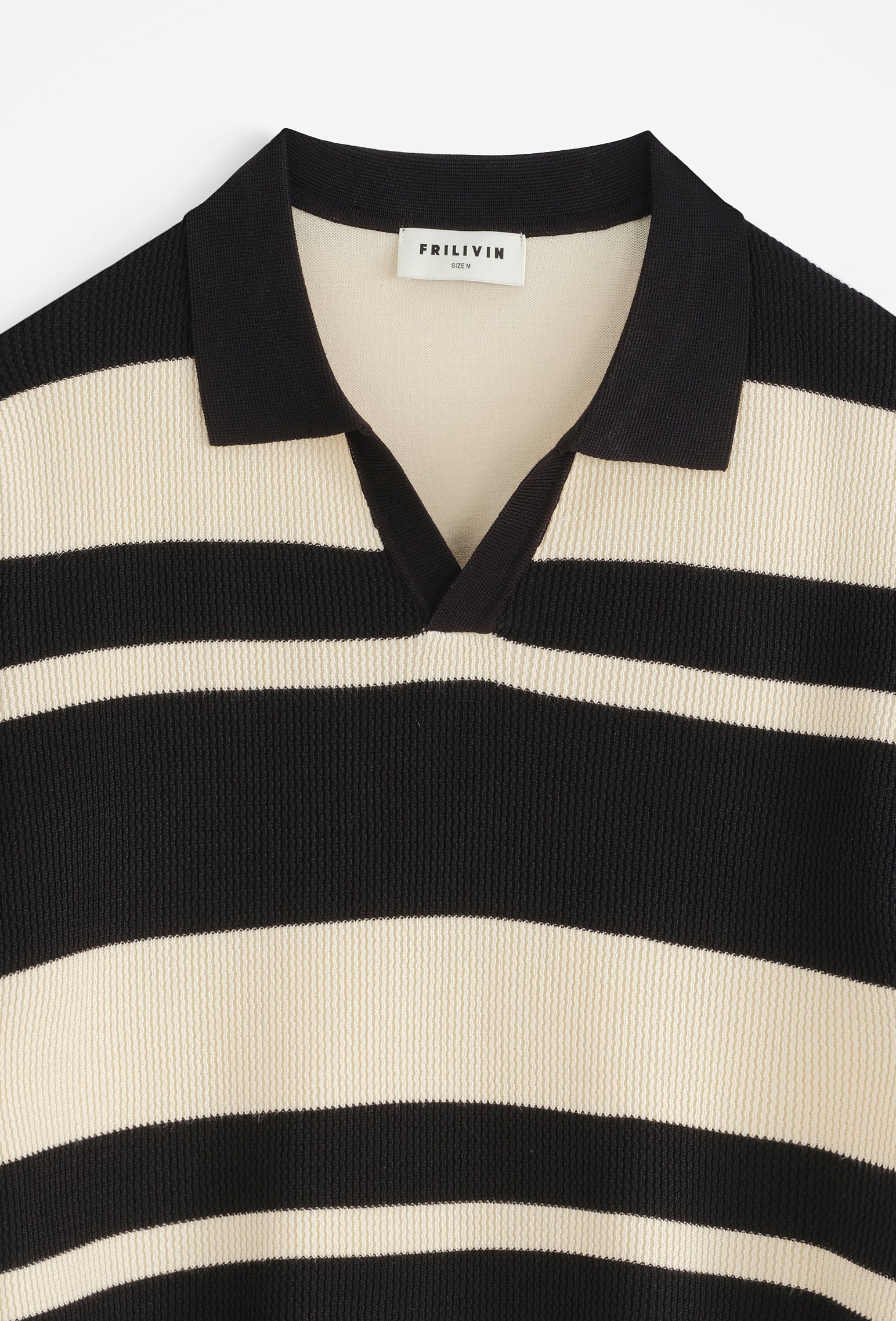 Polo col v ouvert rayé