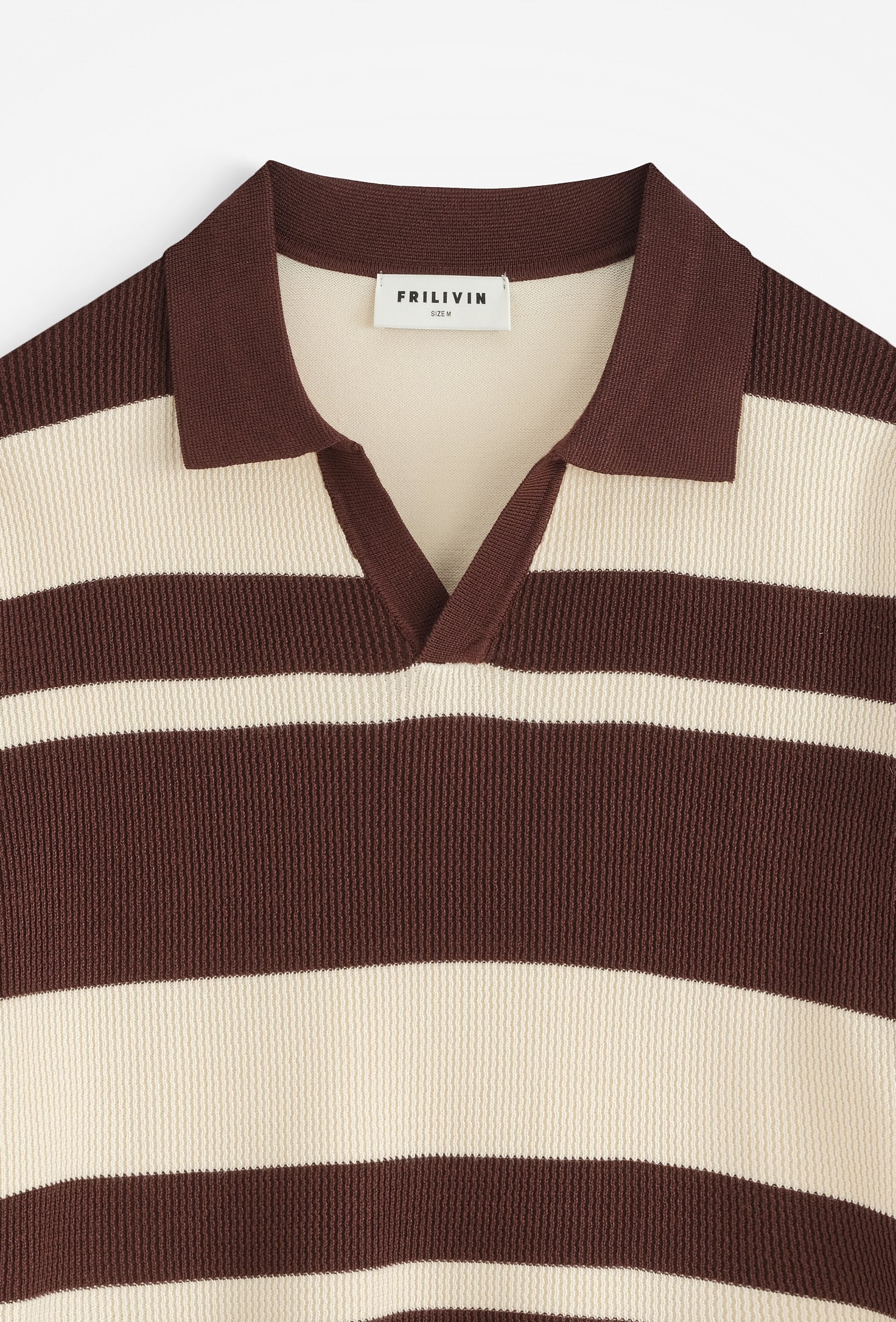 Polo col v ouvert rayé
