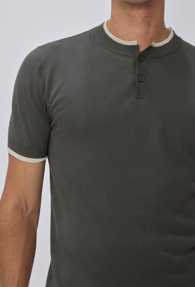 Polo tricoté col montant