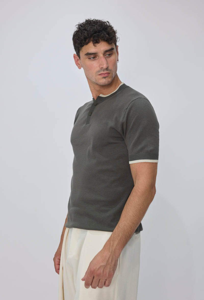 Polo tricoté col montant