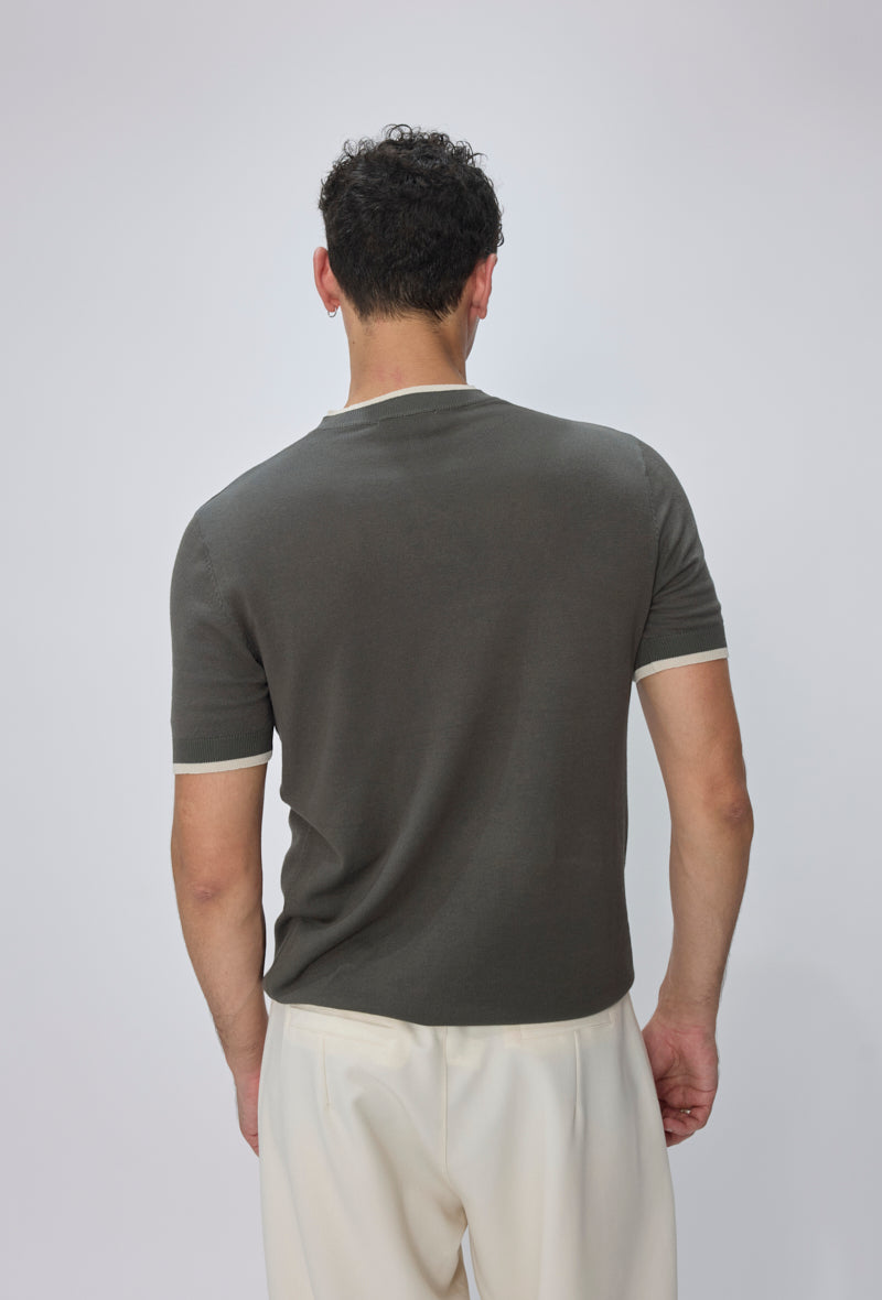 Polo tricoté col montant