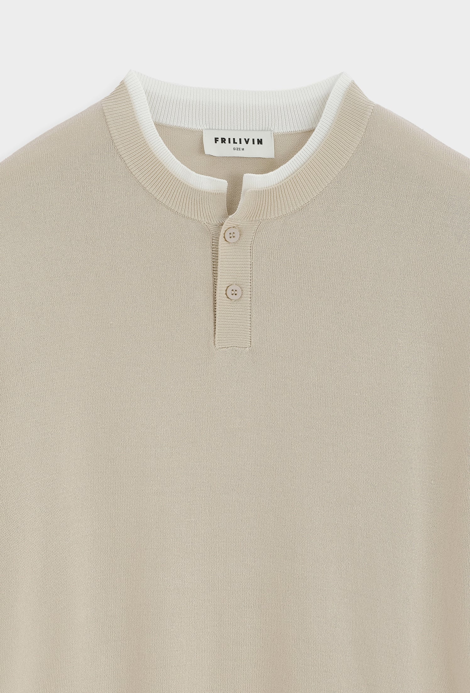 Polo tricoté col montant
