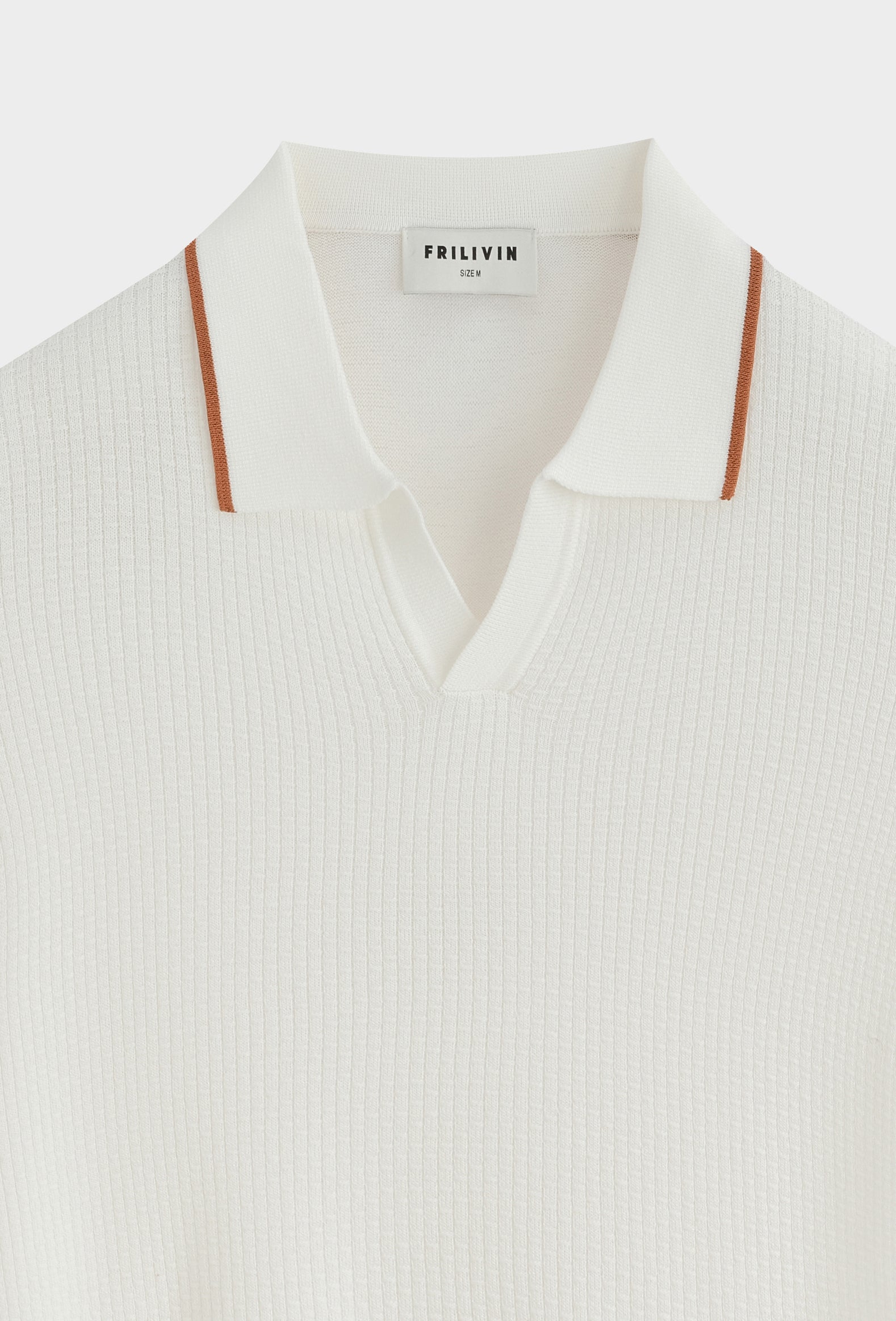 Polo col v ouvert texturé