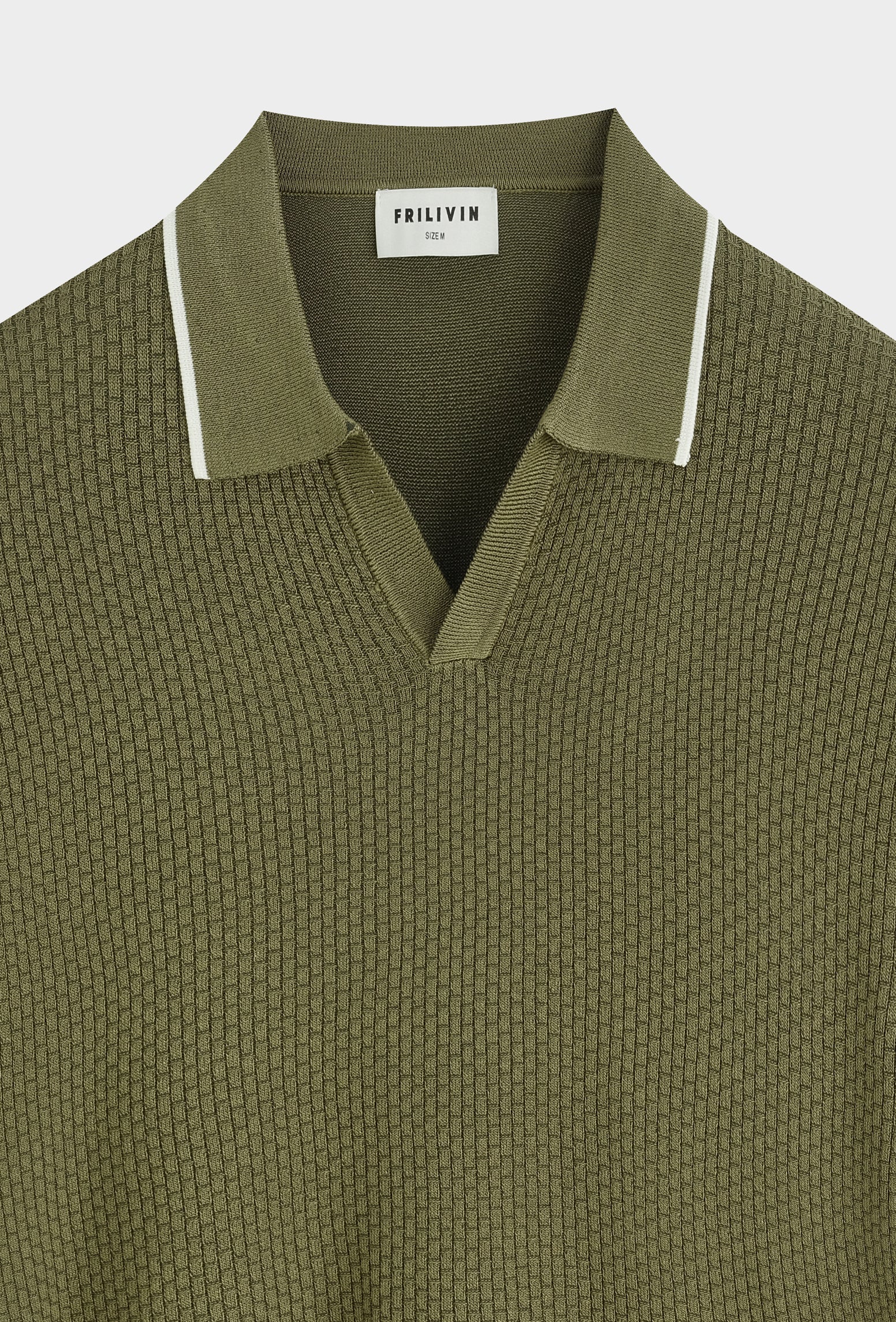 Polo col v ouvert texturé