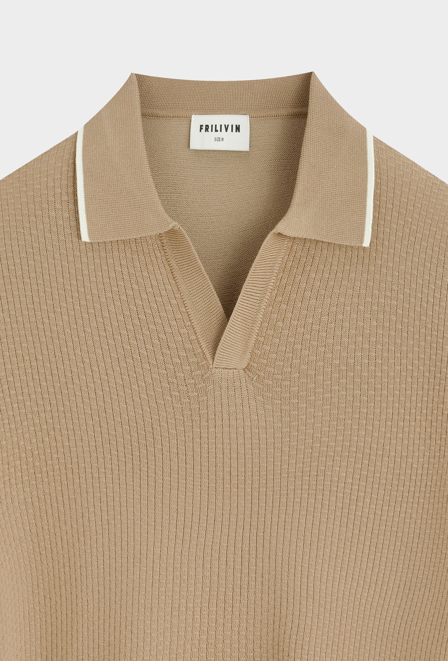 Polo col v ouvert texturé