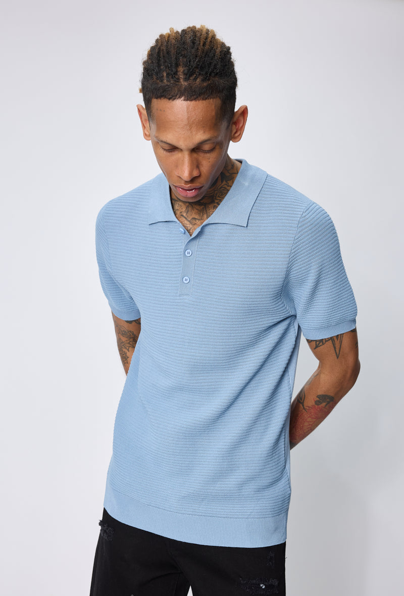 Polo tricoté col ouvert