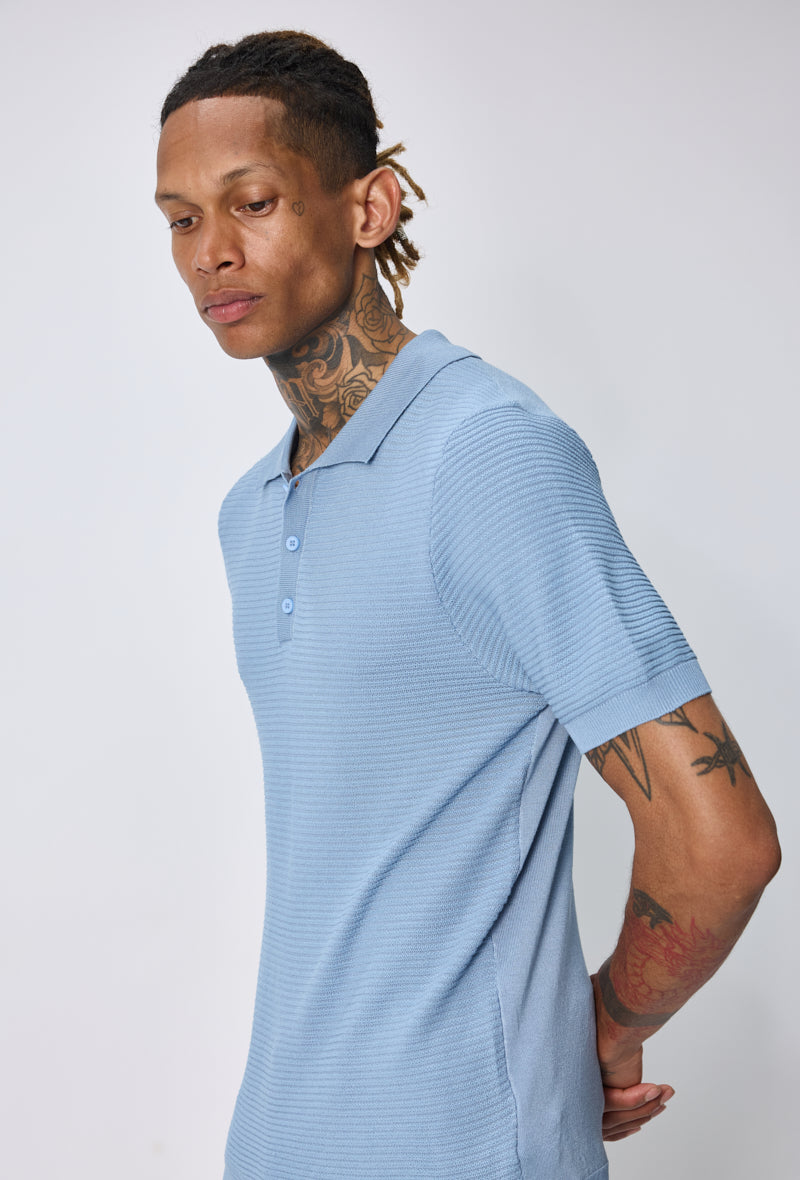 Polo tricoté col ouvert