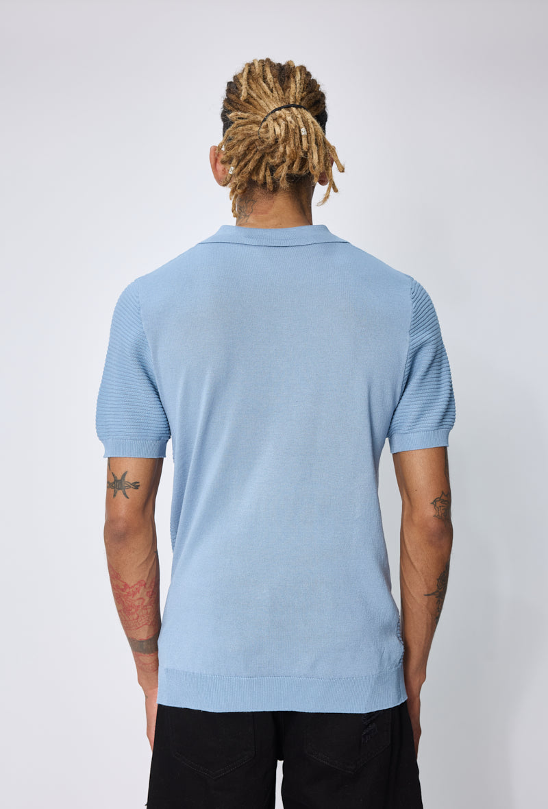 Polo tricoté col ouvert