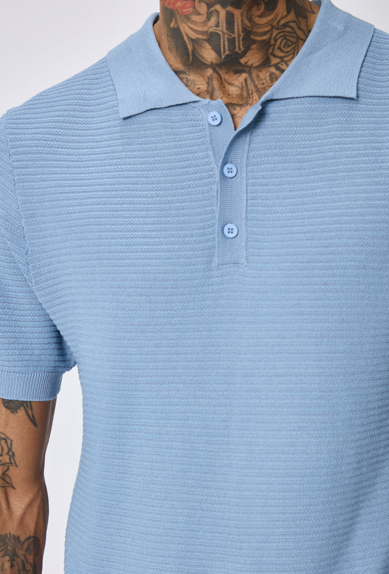 Polo tricoté col ouvert