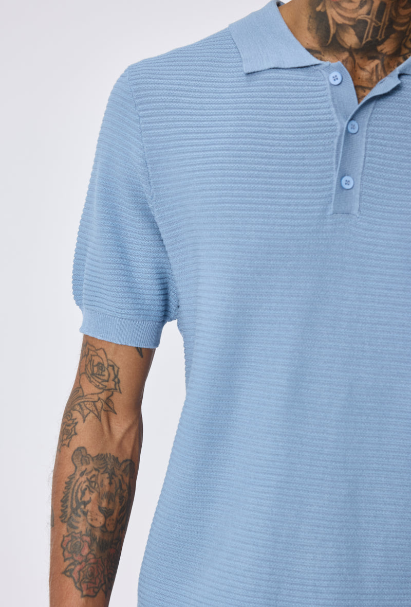 Polo tricoté col ouvert