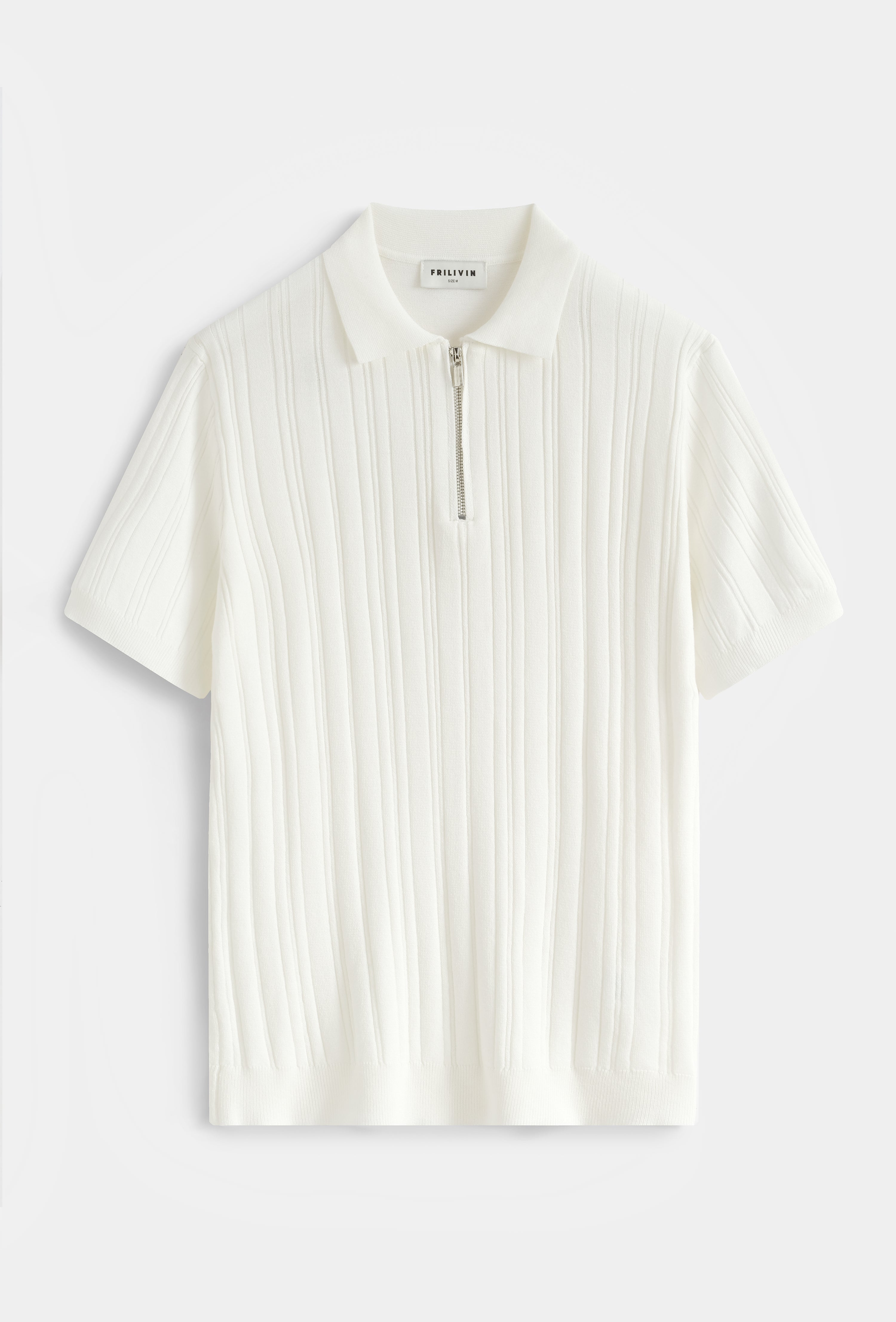 Polo zippé côtelé structuré