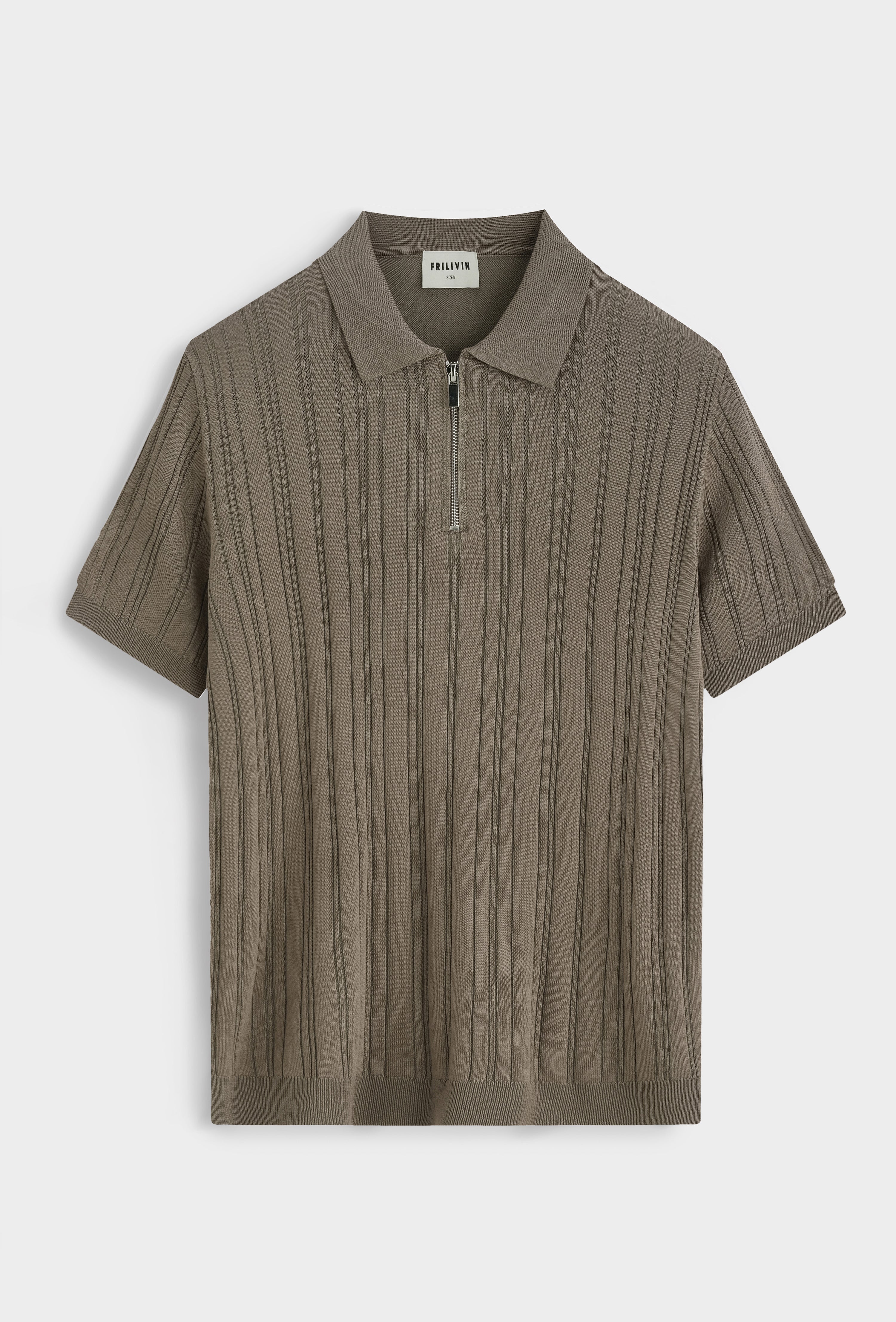 Polo zippé texturé