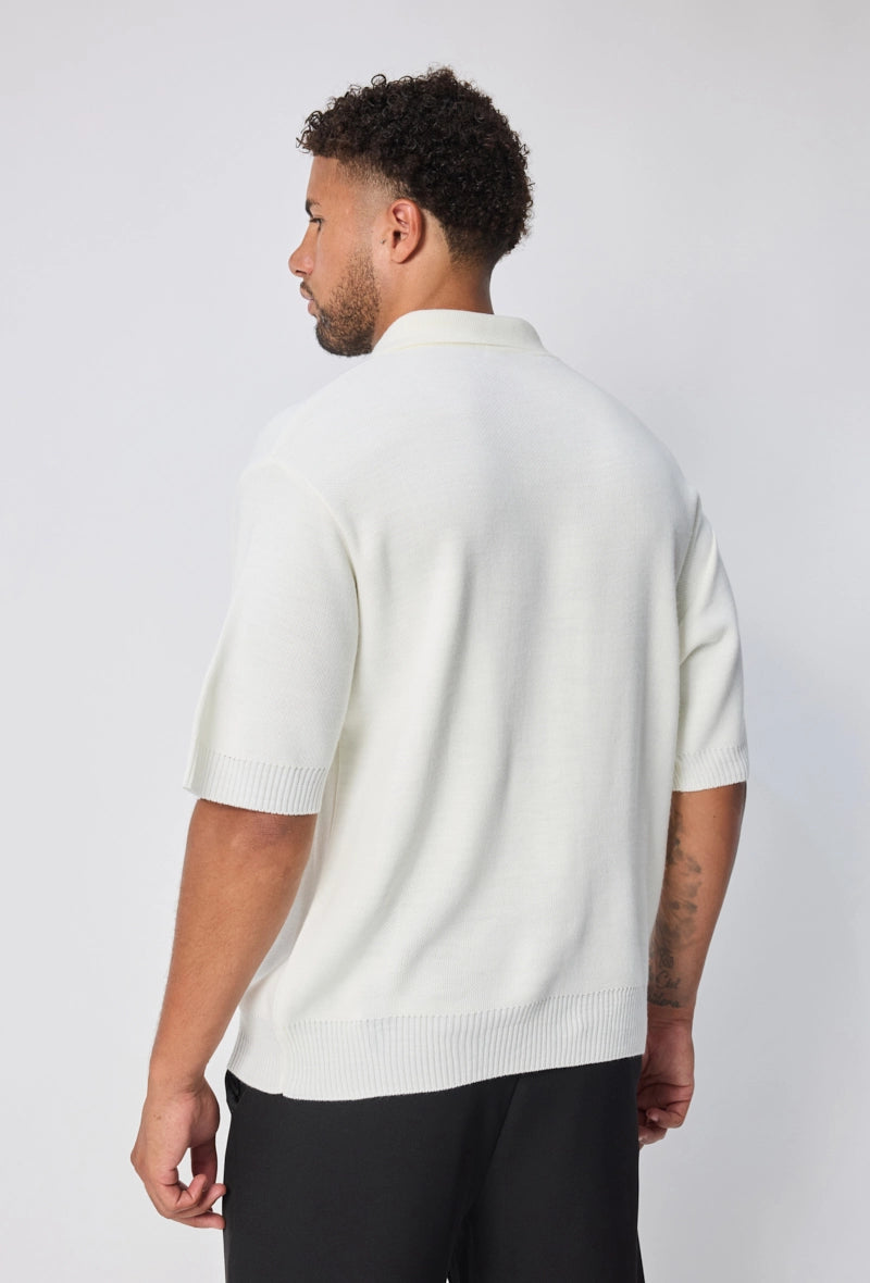 Polo uni à zip