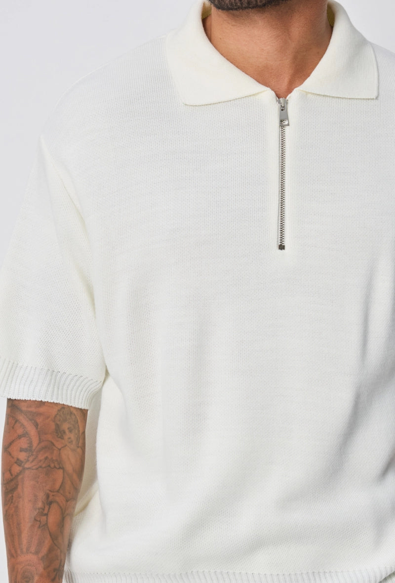 Polo uni à zip