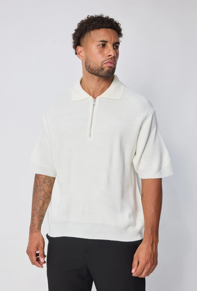 Polo uni à zip