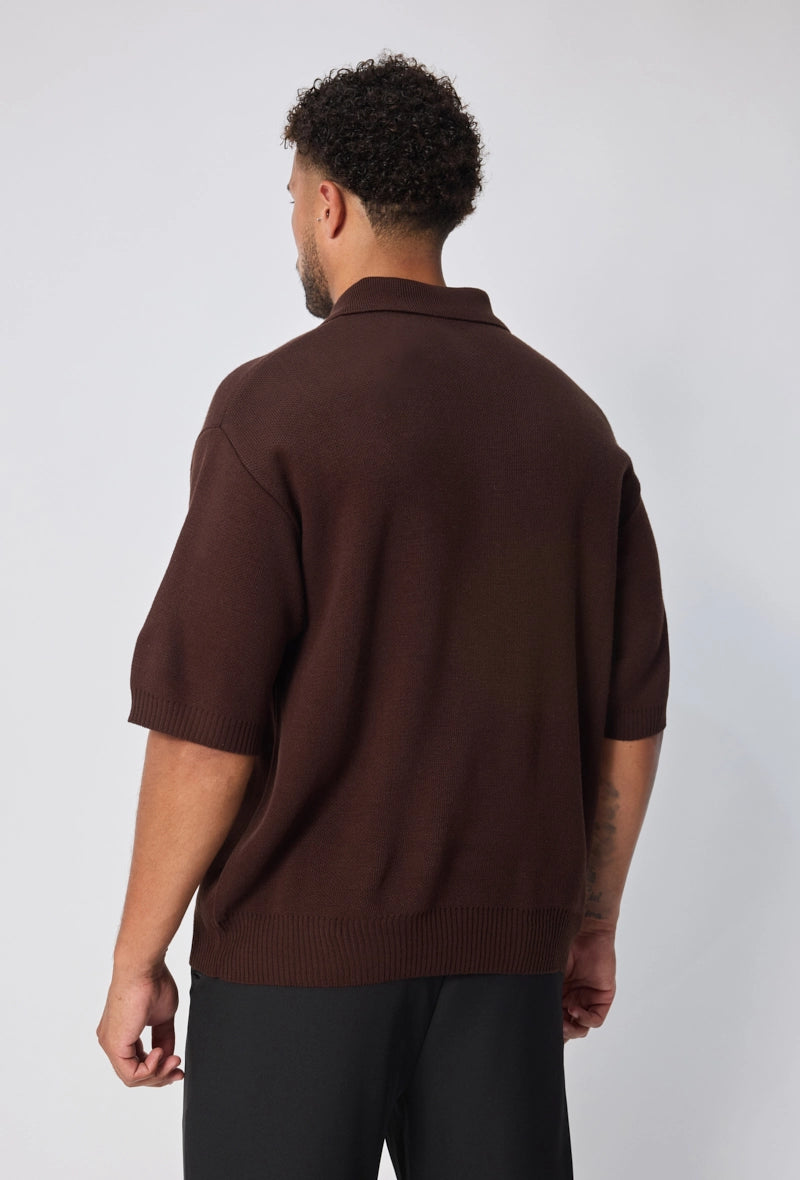 Polo uni à zip