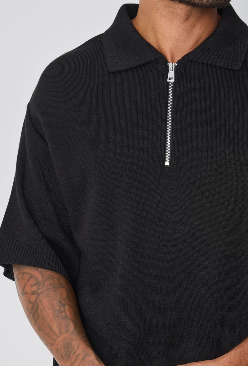 Polo uni à zip