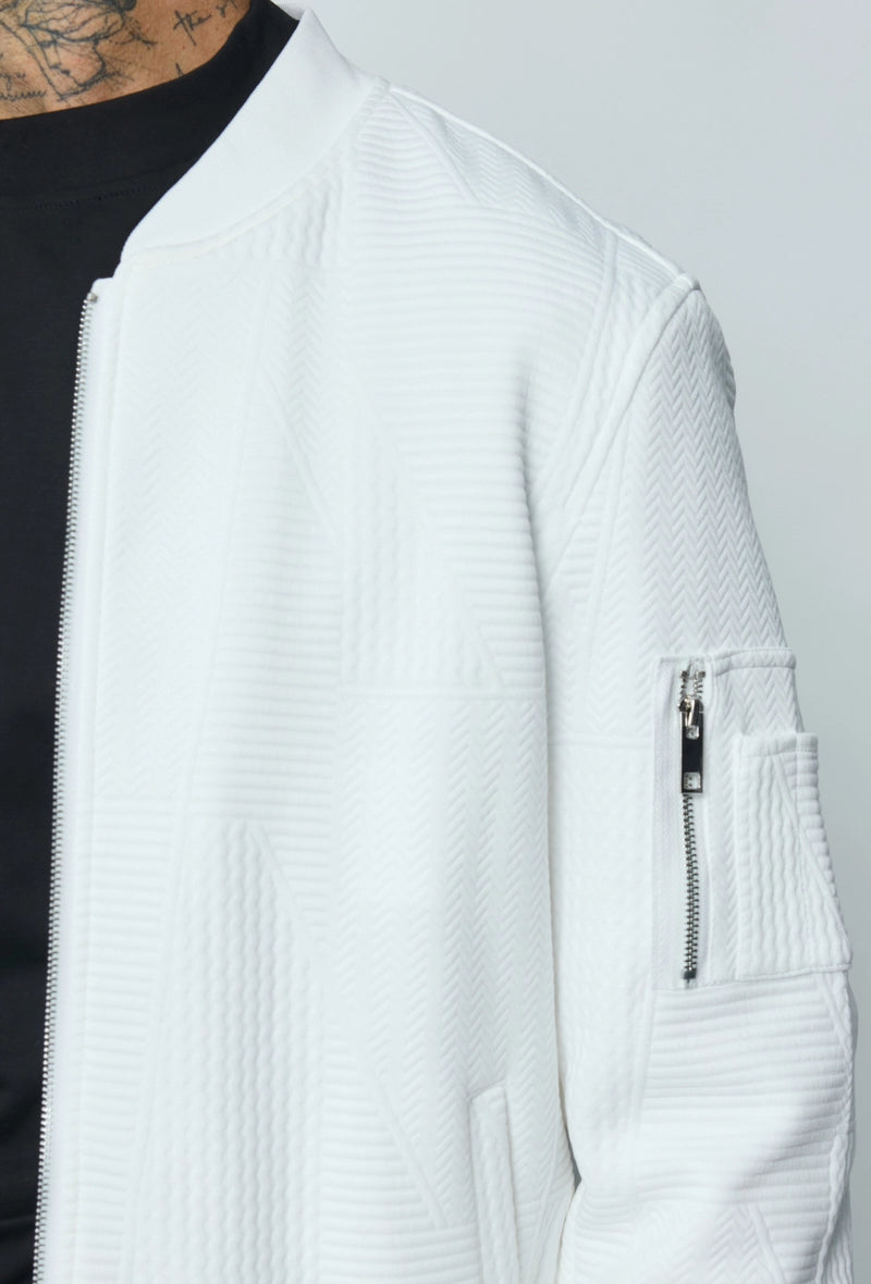 Veste teddy uni motifs géométriques