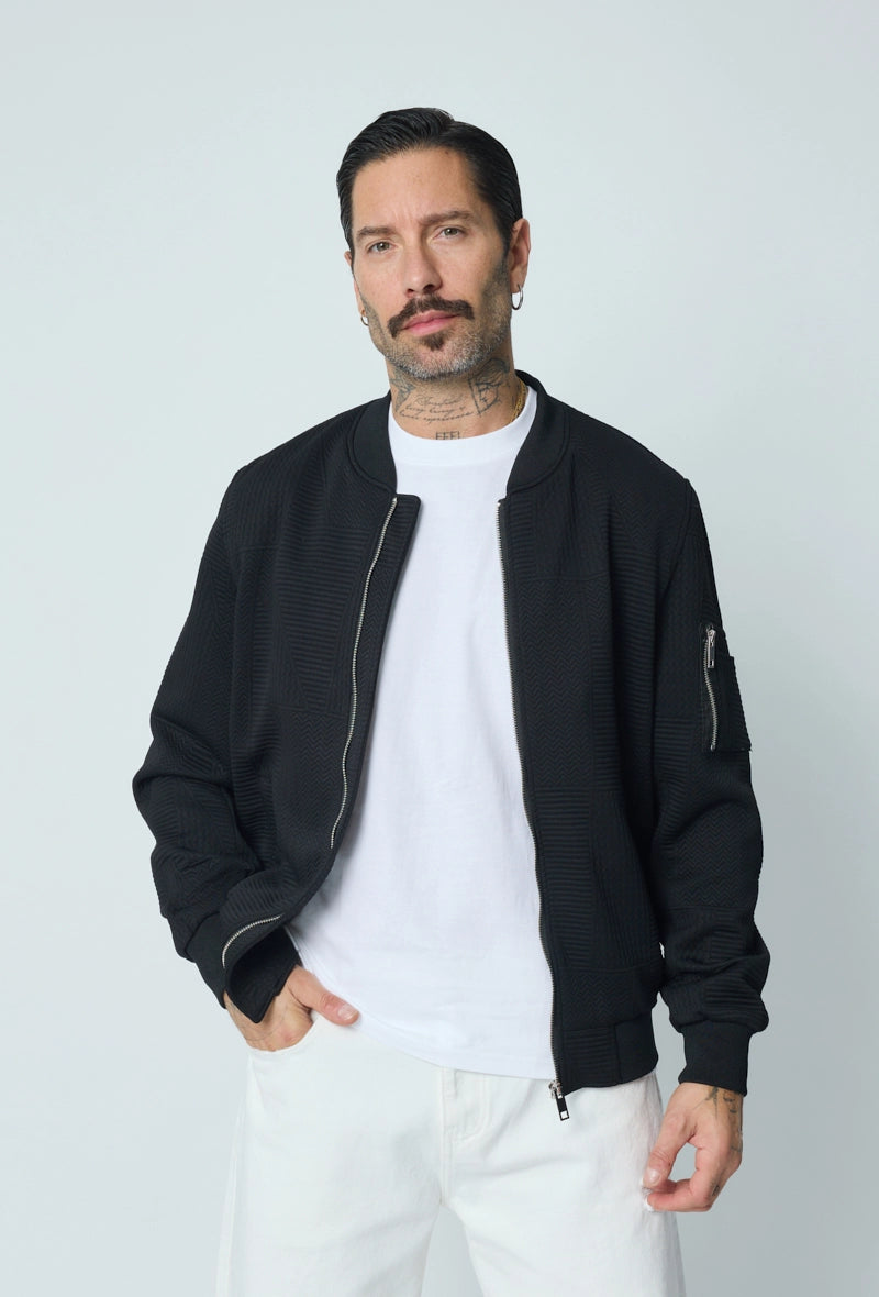 Veste teddy uni motifs géométriques