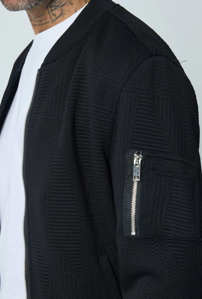 Veste teddy uni motifs géométriques