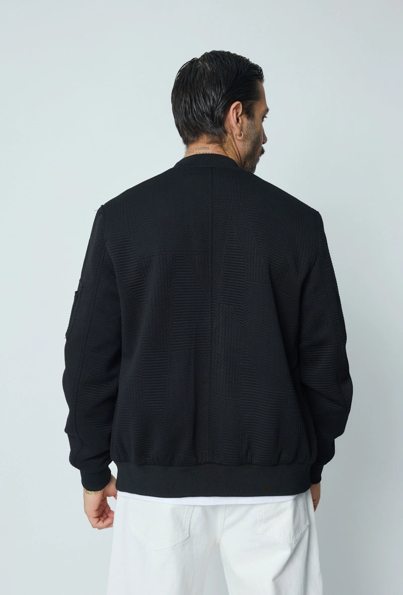 Veste teddy uni motifs géométriques