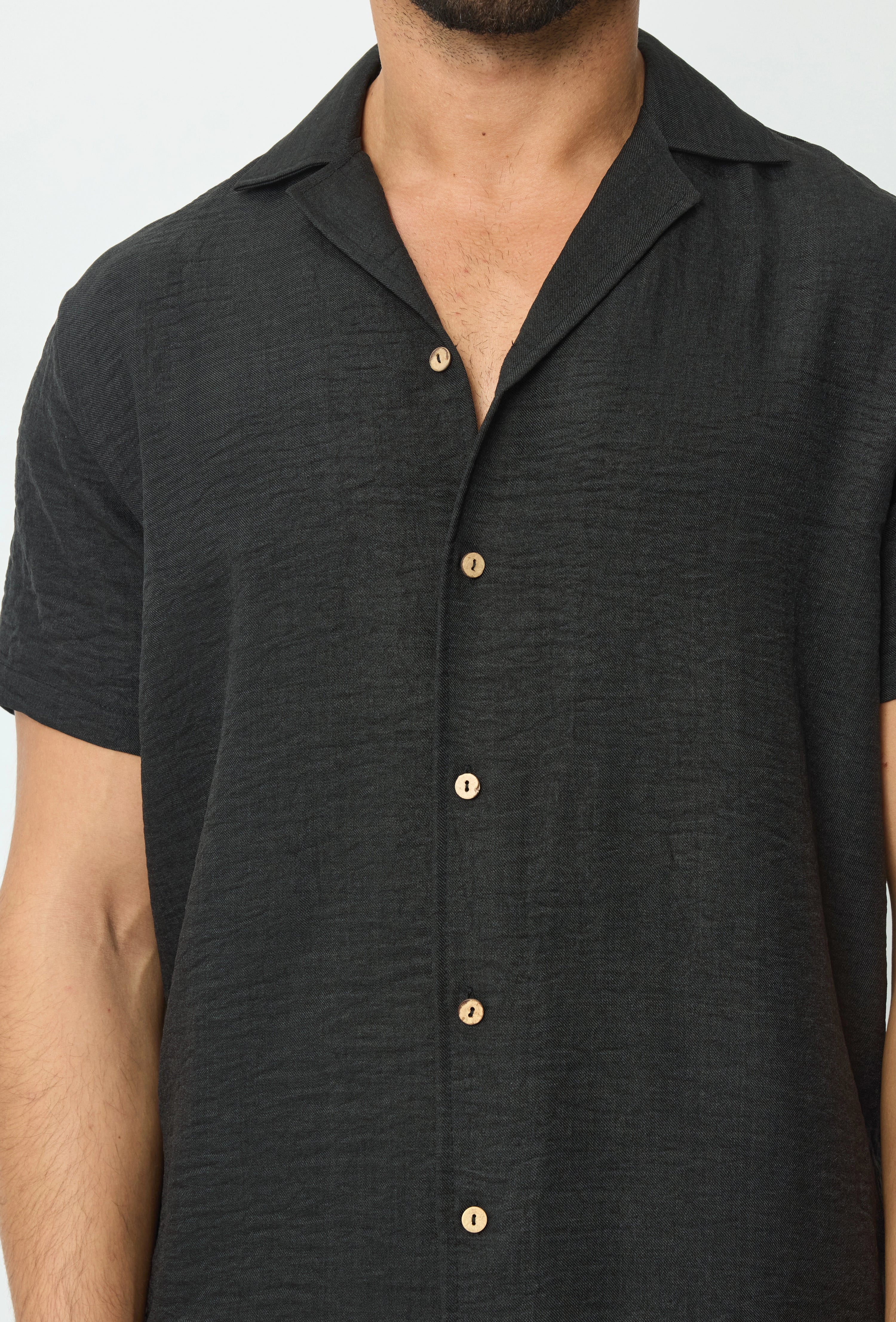 Chemise manches courtes à bouton