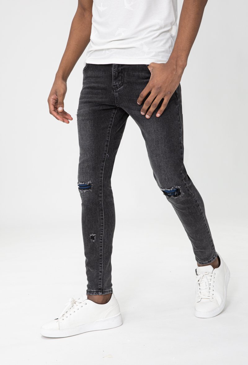 Jean effet déchiré avec empiècement - Frilivin